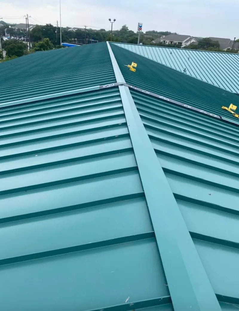 Green commercial metal roof ridge and valley for Metal Roof Repair in Tarpon Springs